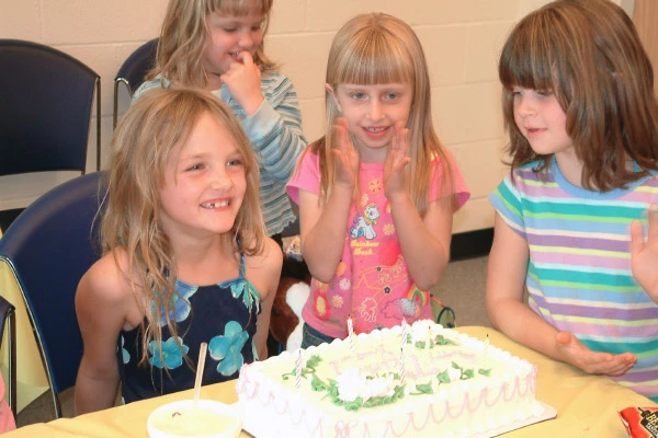 Little girls celebrate a birthday